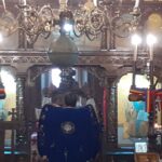 Parintele Cristian rugandu-se in Sfantul Altar